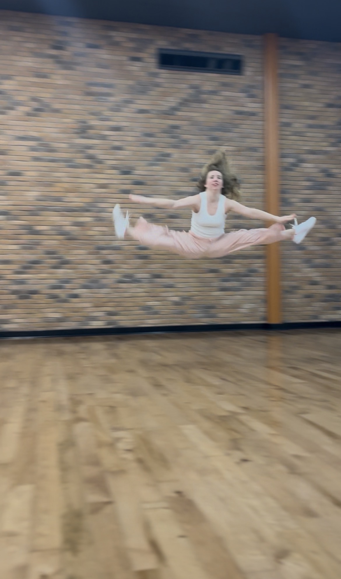 Straddle Jump Toe Touch